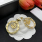 Elegant Gold Toned Round Women Earrings with Pearl and Crystal Embellishment Fashionable Jewelry Accessory