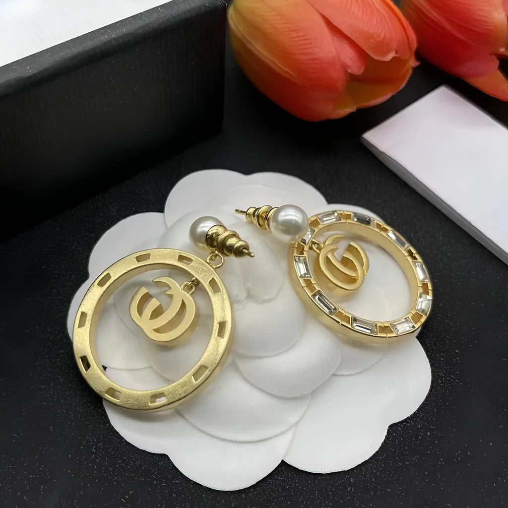 Elegant Gold Toned Round Women Earrings with Pearl and Crystal Embellishment Fashionable Jewelry Accessory