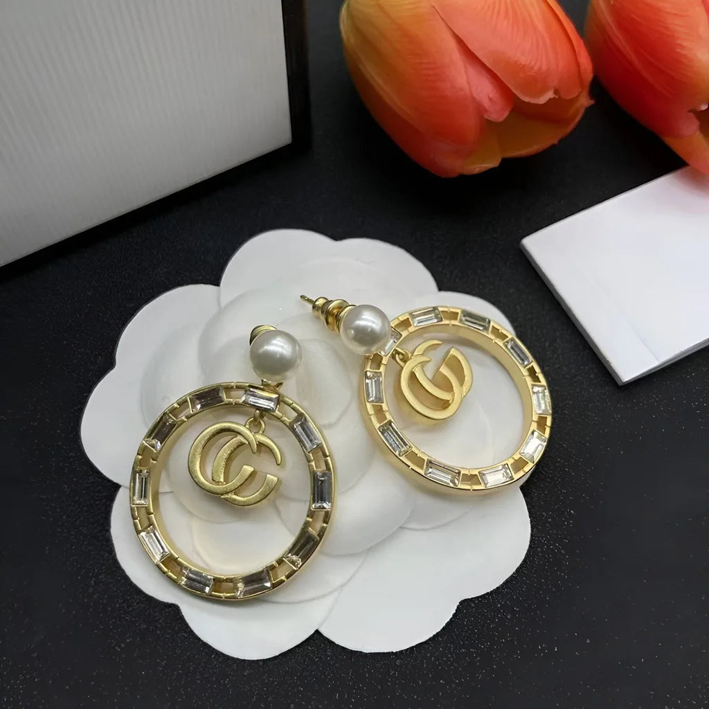 Elegant Gold Toned Round Women Earrings with Pearl and Crystal Embellishment Fashionable Jewelry Accessory